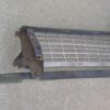 GRILL HEADLIGHT SUPPORT END BRACKET LH