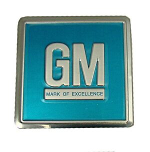 GM MARK OF EXCELLENCE DOOR EMBLEM