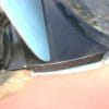 REAR GLASS TO TRUNK FILLER PANEL